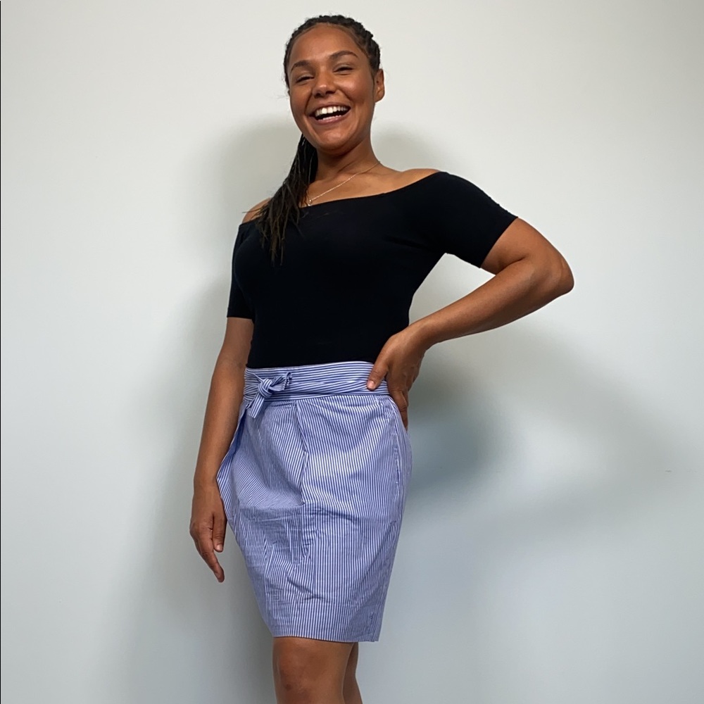 Tie front or back pleated mid thigh skirt